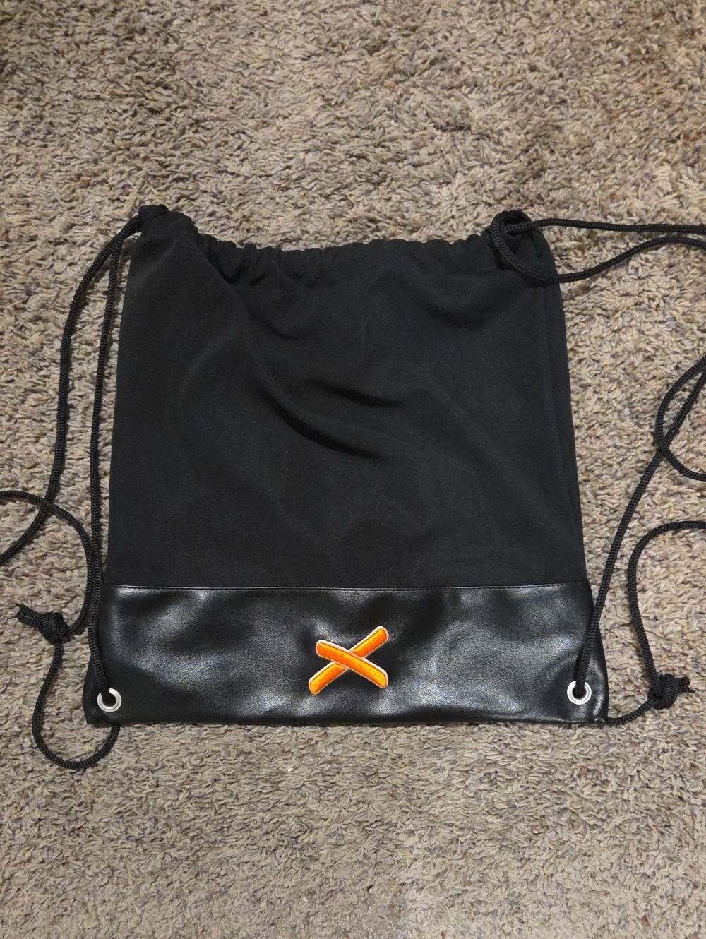 Absolutley Ridiculous Black Drawstring Backpack with Orange Accent Patch